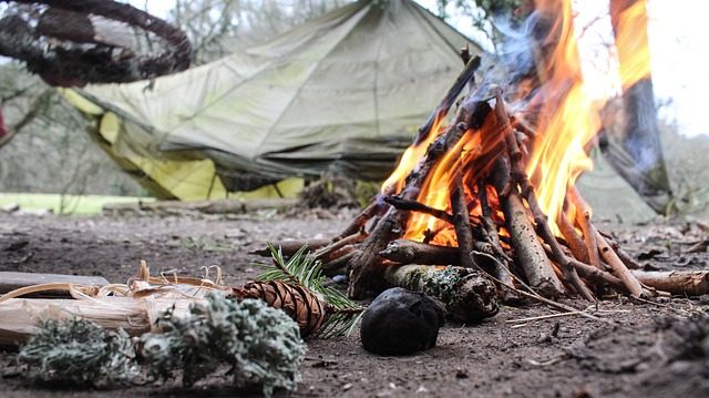 outdoor survival With a campfire and a tent. outdoor survival techniques.