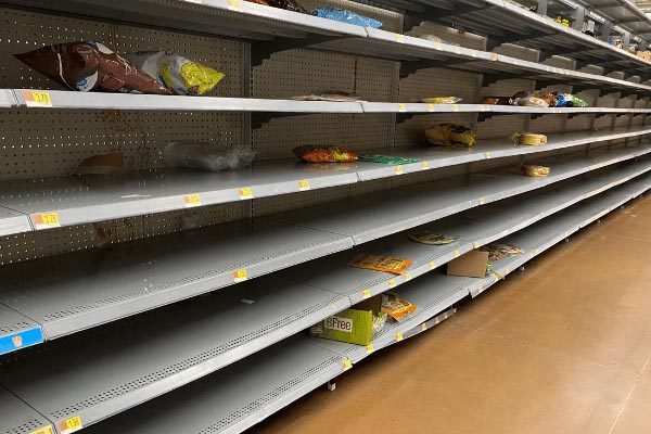 picture of bare shelves in store so and an emergency food supply list